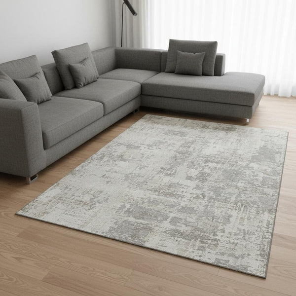 HomeRoots 9' X 12' Ivory And Gray Abstract Area Rug - Washable, UV Protected, Stain Resistant, Durable Design 679137