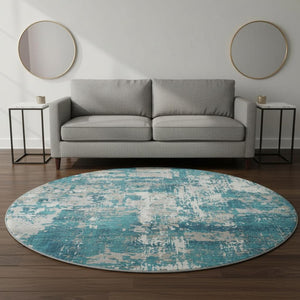 HomeRoots 8' Teal Gray and Ivory Abstract Washable Round Rug - UV Protected, Stain Resistant & Easy Care Design 679159