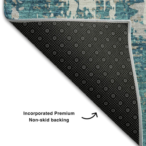HomeRoots 8' Teal Gray and Ivory Abstract Washable Round Rug - UV Protected, Stain Resistant & Easy Care Design 679159