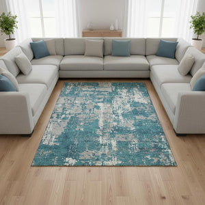 HomeRoots 9' X 12' Teal Gray Ivory Abstract Area Rug - Washable, UV Protected, Stylish & Durable for Every Room 679161