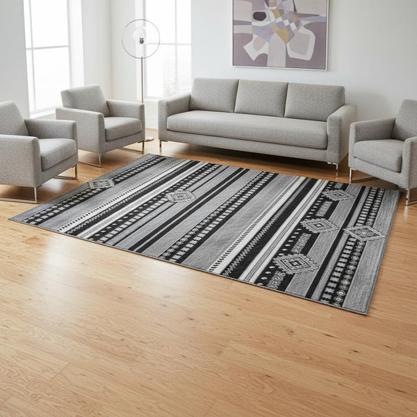 HomeRoots 5' X 8' Tribal Washable Area Rug in Black, Gray & Silver – UV Protection, Stain-Resistant, Durable Design 679254