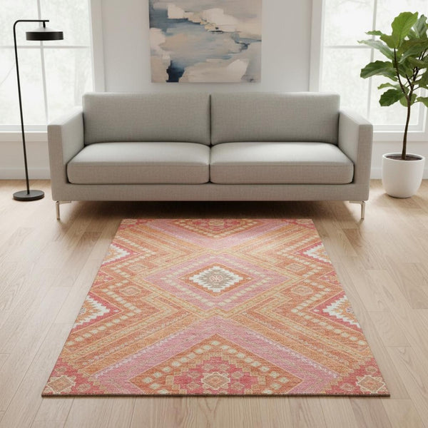HomeRoots 5' X 8' Coral Pink Tribal Area Rug - Washable, UV-Protected, Stain-Resistant Design for Homes 679272