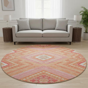HomeRoots 8' Coral Pink and Ivory Tribal Round Rug – Washable, UV-Protected, Stain-Resistant for Busy Homes! 679273