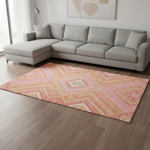 HomeRoots 9' X 12' Coral Pink & Ivory Tribal Area Rug - Durable, Washable, UV-Protected for Family Spaces 679275