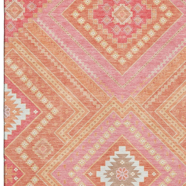 HomeRoots 9' X 12' Coral Pink & Ivory Tribal Area Rug - Durable, Washable, UV-Protected for Family Spaces 679275