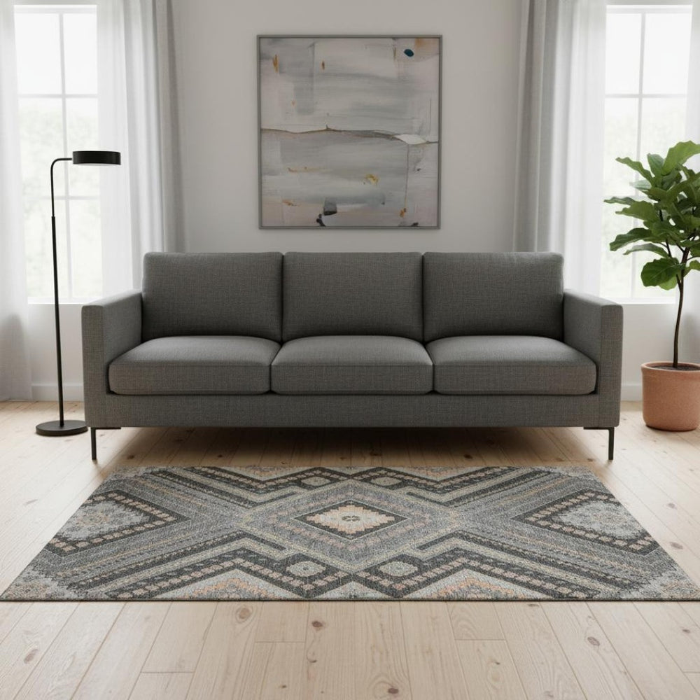 HomeRoots 5' X 8' Gray Peach Silver Tribal Area Rug - Washable, UV Protected, Stain Resistant, Soft Comfort 679284