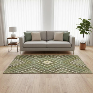 HomeRoots 5' X 8' Tribal Washable Area Rug in Olive Green, Ivory & Brown - UV Protected, Durable & Stylish! 679302