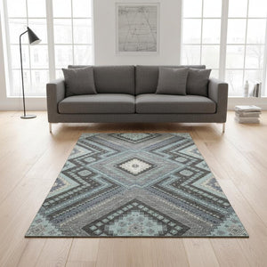 HomeRoots 5' X 8' Pewter Gray Tribal Area Rug - Washable, UV-Protected, Stain Resistant for Modern Living Spaces 679308