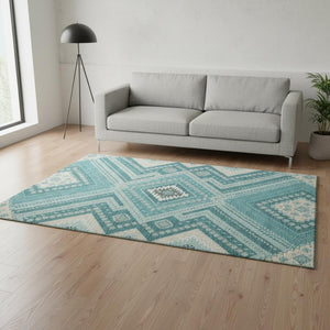 HomeRoots 5' X 8' Stylish Tribal Area Rug in Teal, Beige & Aqua - Washable, UV-Protected & Kid-Friendly Design 679314