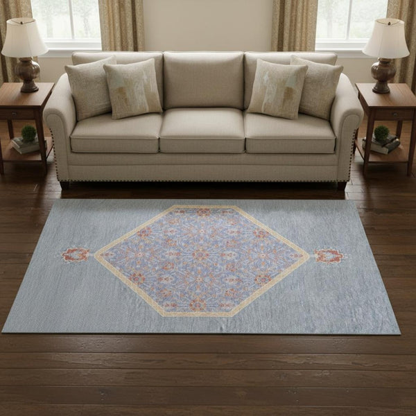 HomeRoots 9' X 12' Denim Blue Area Rug - Washable Oriental Design with Coral Accents & UV Protection for Durability 679353