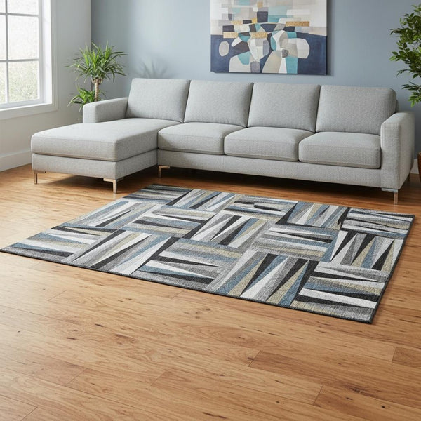 HomeRoots 8' X 10' Modern Geometric Black Beige Ivory Area Rug - Washable, UV Protected, Pet Friendly Design 679400