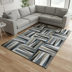 HomeRoots 9' X 12' Modern Geometric Washable Area Rug in Black, Beige & Ivory - Stain & UV Resistant Design 679401