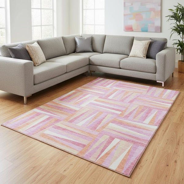 HomeRoots 9' X 12' Blush Peach Geometric Area Rug - Washable, UV Protected, Perfect for Busy Homes & Families 679407