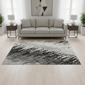 HomeRoots 5' X 8' Black, Ivory & Gray Striped Washable Area Rug - Durable, UV Protected & Stain Resistant! 679476