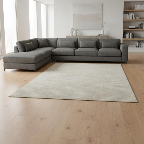HomeRoots 10' Geometric Washable Area Rug in Beige & Ivory - UV Protected, Stain-Resistant for High-Traffic Areas 679690
