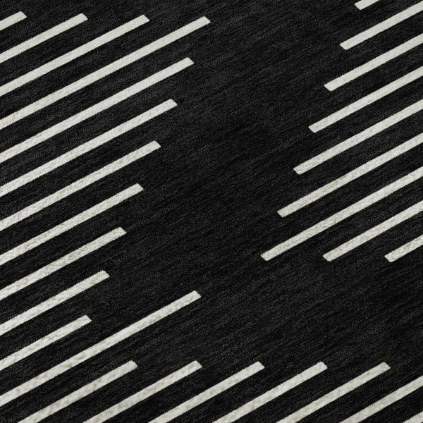 HomeRoots 8' Modern Black and Ivory Geometric Washable Round Rug with UV Protection for High-Traffic Areas 679693