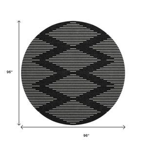 HomeRoots 8' Modern Black and Ivory Geometric Washable Round Rug with UV Protection for High-Traffic Areas 679693