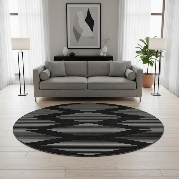 HomeRoots 8' Modern Black and Ivory Geometric Washable Round Rug with UV Protection for High-Traffic Areas 679693