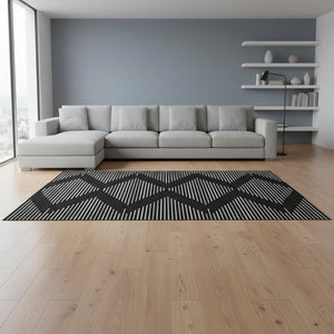 HomeRoots 9' X 12' Black and Ivory Geometric Area Rug - Washable, UV-Protected, Durable for Busy Homes! 679695