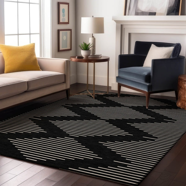 HomeRoots 9' X 12' Black and Ivory Geometric Area Rug - Washable, UV-Protected, Durable for Busy Homes! 679695