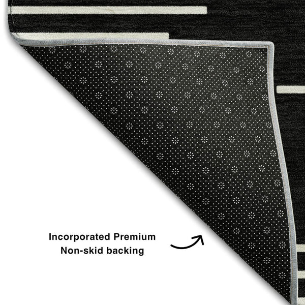 HomeRoots 9' X 12' Black and Ivory Geometric Area Rug - Washable, UV-Protected, Durable for Busy Homes! 679695