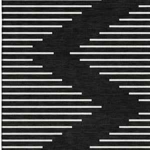 HomeRoots 9' X 12' Black and Ivory Geometric Area Rug - Washable, UV-Protected, Durable for Busy Homes! 679695