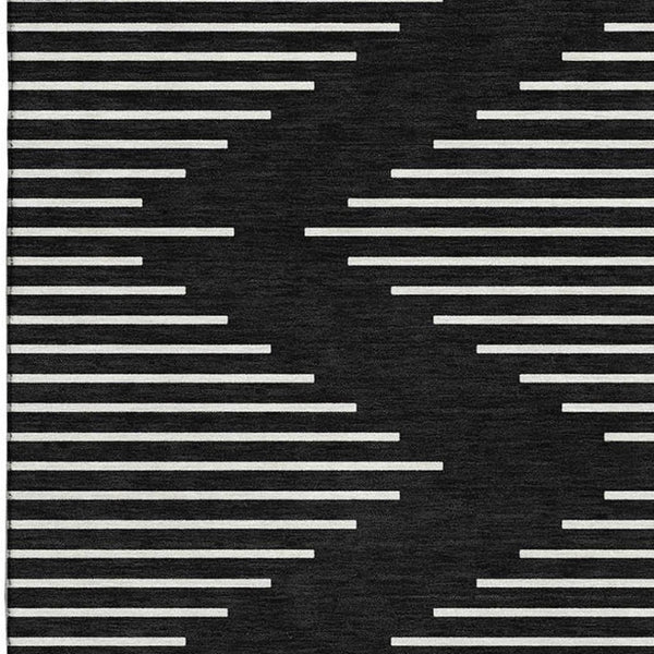HomeRoots 9' X 12' Black and Ivory Geometric Area Rug - Washable, UV-Protected, Durable for Busy Homes! 679695
