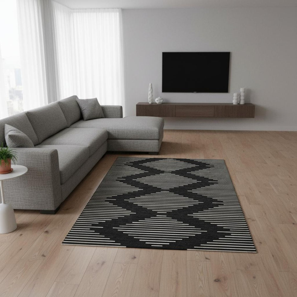 HomeRoots 10' Black And Ivory Geometric Area Rug - Washable, UV Protected, Perfect for High-Traffic Spaces! 679696