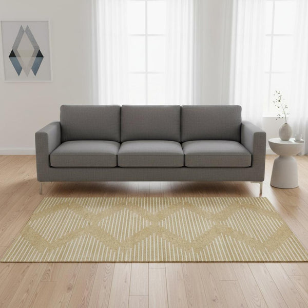 HomeRoots 5' X 8' Gold And Ivory Geometric Area Rug - Washable, UV-Protected, Stain-Resistant Beauty for Homes 679728