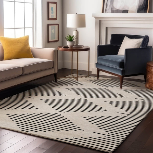 HomeRoots 5' X 8' Ivory And Black Geometric Area Rug - Stylish, Washable, UV Protected for Modern Spaces 679740