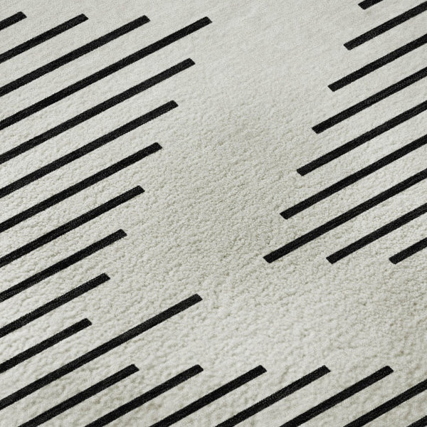 HomeRoots 5' X 8' Ivory And Black Geometric Area Rug - Stylish, Washable, UV Protected for Modern Spaces 679740