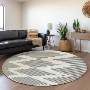 HomeRoots 8' Ivory and Black Geometric Round Rug - Washable, UV-Protected, Stain-Resistant, Durable Design 679741