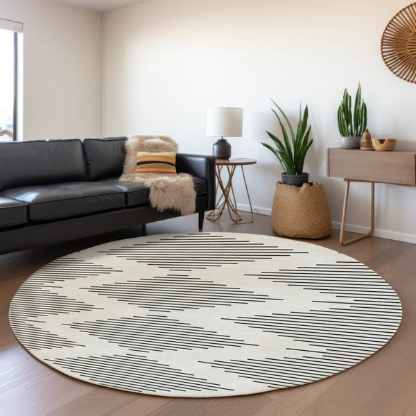 HomeRoots 8' Ivory and Black Geometric Round Rug - Washable, UV-Protected, Stain-Resistant, Durable Design 679741