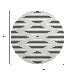 HomeRoots 8' Ivory and Black Geometric Round Rug - Washable, UV-Protected, Stain-Resistant, Durable Design 679741