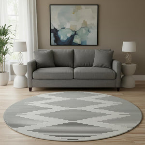 HomeRoots 8' Ivory and Black Geometric Round Rug - Washable, UV-Protected, Stain-Resistant, Durable Design 679741