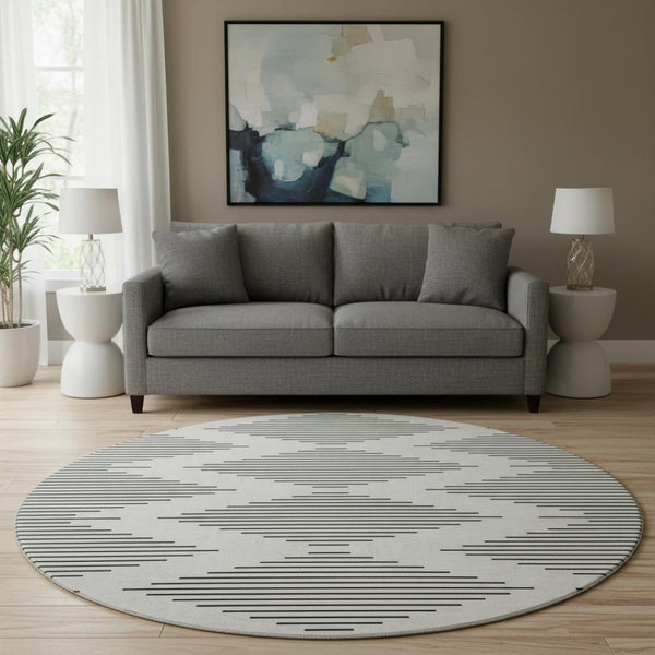 HomeRoots 8' Ivory and Black Geometric Round Rug - Washable, UV-Protected, Stain-Resistant, Durable Design 679741
