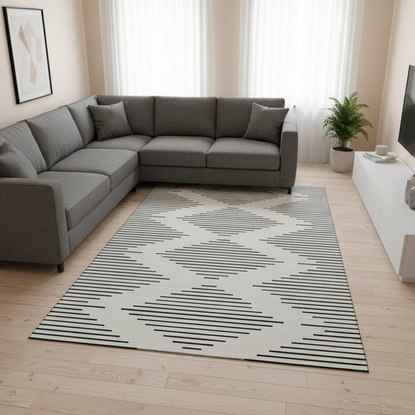 HomeRoots 8' X 10' Ivory and Black Geometric Washable Area Rug - UV Protected, Durable & Stylish for Any Space 679742