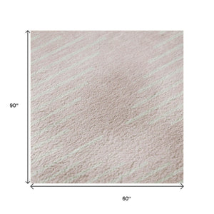 HomeRoots 5' X 8' Pink and Ivory Geometric Area Rug - Washable, UV-Protected, Perfect for High-Traffic Spaces! 679764