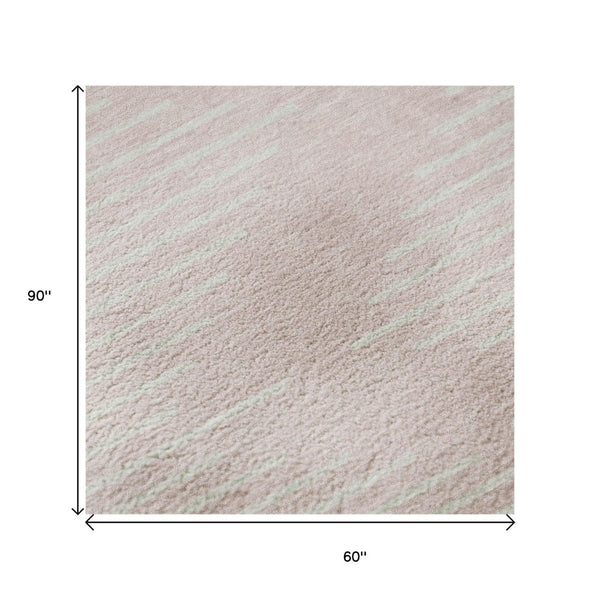HomeRoots 5' X 8' Pink and Ivory Geometric Area Rug - Washable, UV-Protected, Perfect for High-Traffic Spaces! 679764