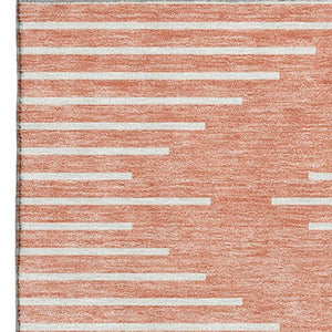 HomeRoots 5' X 8' Salmon and Ivory Geometric Area Rug - Washable, UV Protected, Stylish, and Durable Design 679776