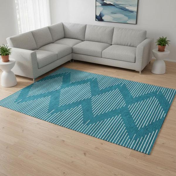 HomeRoots 8' X 10' Teal and Ivory Geometric Area Rug – Durable, Washable, UV-Protected for Everyday Living 679784