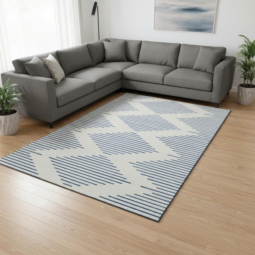 HomeRoots 8' X 10' Washable Ivory & Navy Geometric Area Rug with UV Protection for High Traffic Homes 679826