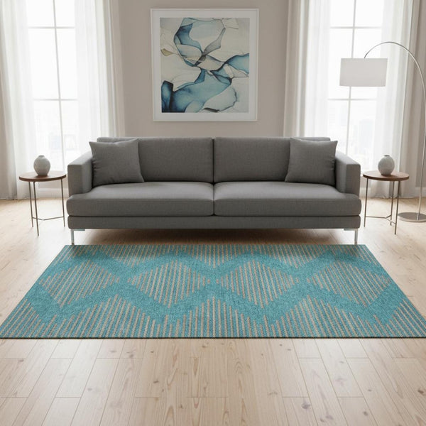 HomeRoots 5' X 8' Teal and Peach Geometric Area Rug - Washable, UV Protected, Durable & Stylish for Any Room 679860