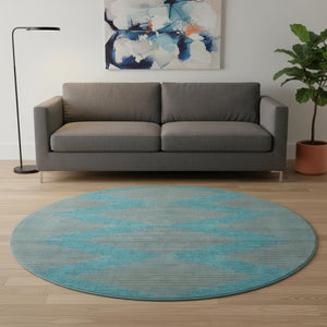 HomeRoots 8' Teal and Peach Geometric Round Rug - Washable, UV Protected, Soft & Durable for High-Traffic Areas 679861