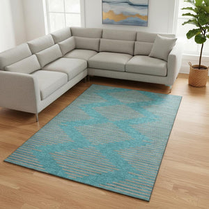 HomeRoots 8' X 10' Teal and Peach Geometric Area Rug - Washable, UV Protected, Ideal for Busy Homes and Pets 679862