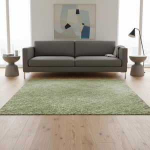 HomeRoots 5' X 8' Green and Ivory Abstract Area Rug - Washable, UV Protected, Perfect for High-Traffic Spaces! 679937