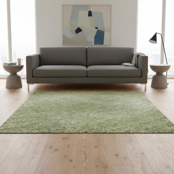 HomeRoots 5' X 8' Green and Ivory Abstract Area Rug - Washable, UV Protected, Perfect for High-Traffic Spaces! 679937