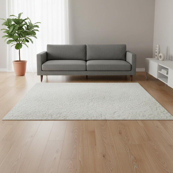 HomeRoots 5' X 8' Ivory And Beige Abstract Washable Area Rug - Durable, Stylish, UV-Protected for All Spaces 679949