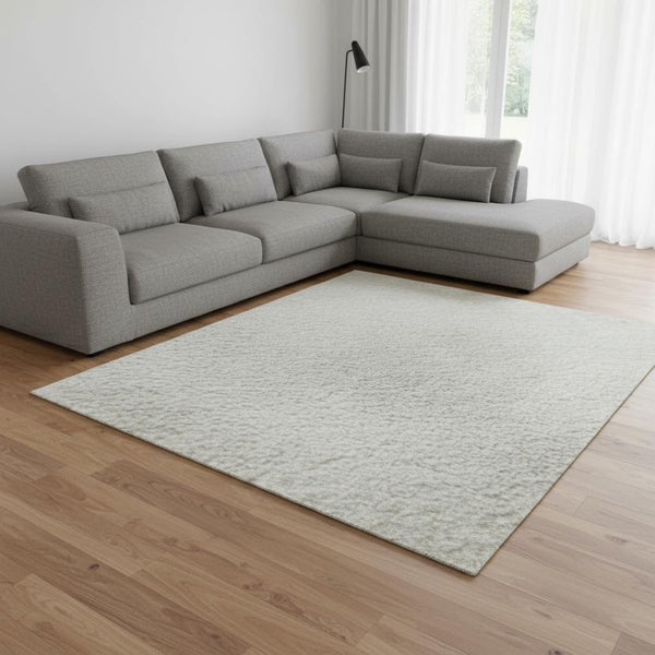 HomeRoots 10' X 14' Ivory and Beige Abstract Area Rug with UV Protection - Stylish, Durable, Easy-Care Design! 679953