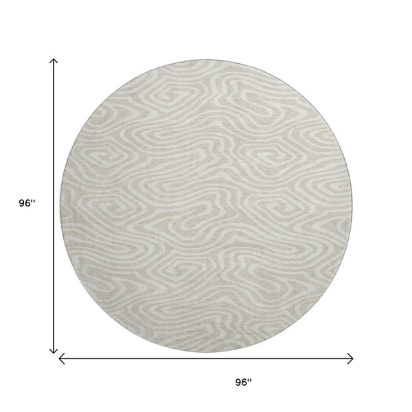 HomeRoots 8' Beige and Ivory Abstract Round Washable Rug - Stain Resistant, UV Protected for High Traffic Areas 680064
